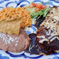 Burrito Suizo · Guest Favorites. Flour tortilla with choice of ground beef, chicken, steak, or vegetables. T...