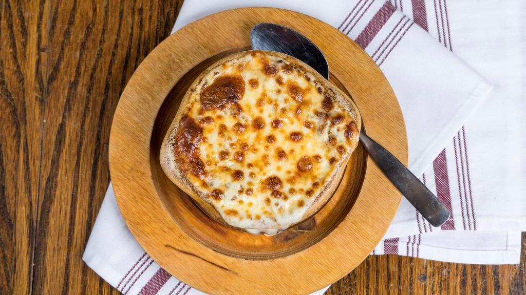 Baked French Onion Soup · This is not your average bowl of soup. Teresa's 30 year recipe of homemade  Baked French Onion has been a restaurant favorite since the 1980s.