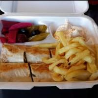 Shawarma Arabic Plate · Chicken sandwich come withe fries and garlic says and pickel
If you would like veggies insid...