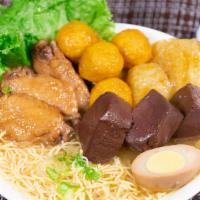 #1 Chi Noodle Bowl / 招牌湯麵 · Fish balls & pork skin, Swiss wings, pig’s blood, marinated egg, thin egg noodles in chicken...