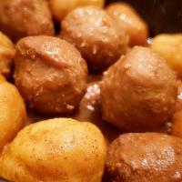 咖哩魚丸 / Curry Fish Balls · Fish balls, pork skin in curry sauce.