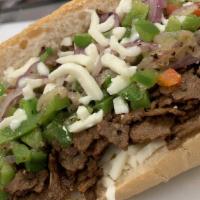 Ny Philly Drink & Chips · Freshly sliced steak with onions, bell pepper & melted provolone cheese.