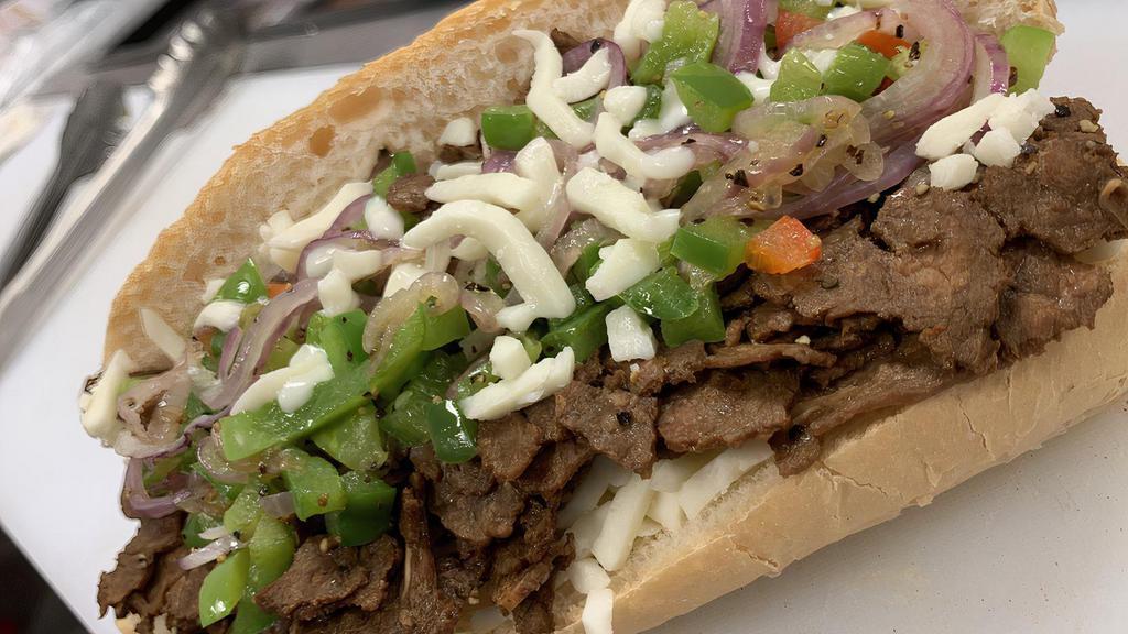 Ny Philly Drink & Chips · Freshly sliced steak with onions, bell pepper & melted provolone cheese.