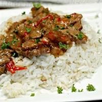 Pepper Steak & Rice Dinner · Comes with side salad.