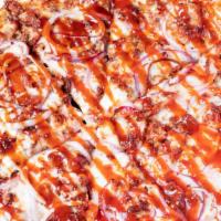 Burnt Ends Pizza · Signature cream cheese sauce, BBQ sauce, burnt ends, onion , bacon, BBQ sauce drizzle