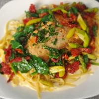 Salmone Alla Vodka · Pan-seared wild-caught salmon fillet with, sun-dried tomatoes, asparagus, spinach, and vodka...