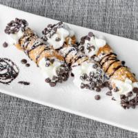 Cannoli · Cannoli shell with cannoli filling which is made with creamy whipped ricotta cheese, extra-f...