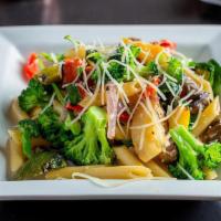 Penne Verdure · Tube Pasta with mixed vegetables, mushrooms, spinach, broccoli and onions in olive oil and g...
