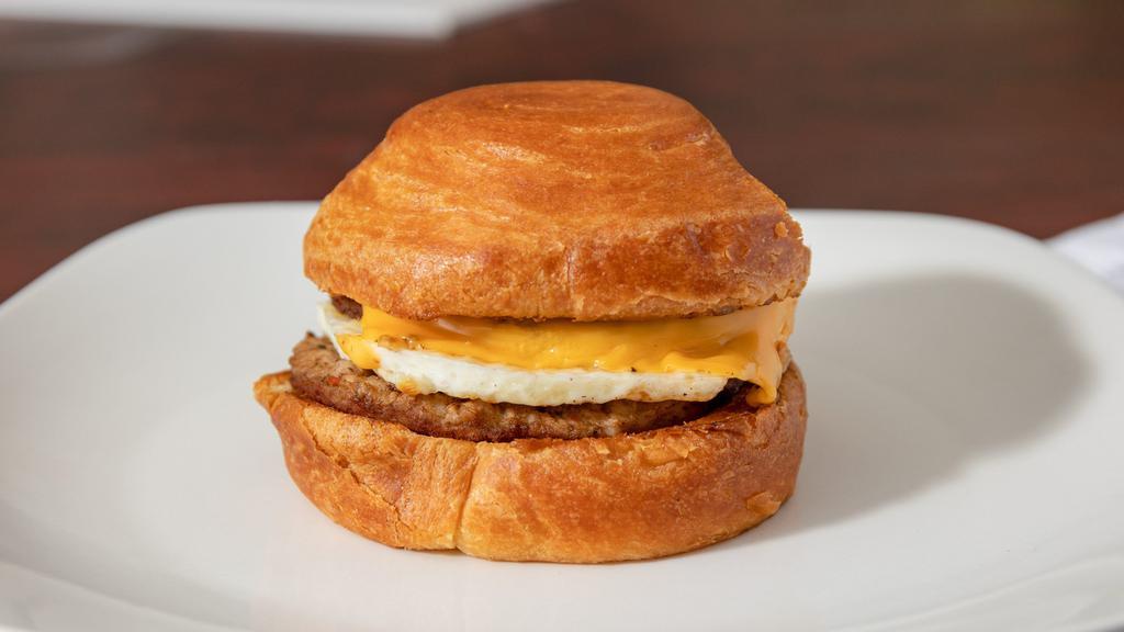 Turkey Sausage And Eggs · Turkey Sausage, Eggs & American cheese on croissant Bun