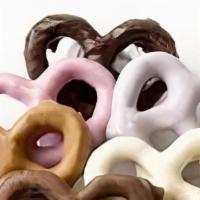 Gourmet Pretzels · Pretzels dipped in/or decorated in chocolate, colors and shapes may vary, beautifully design...