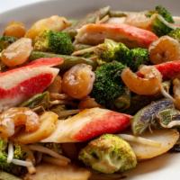 Asian Seafood Bowl · Your choice of protein with tomatoes, bean sprouts, water chestnuts, broccoli, and pea pods ...