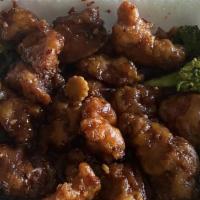￼ General Tso'S Chicken · Hot and spicy. Lightly battered chicken sautéed with baby corn and green onions in a tangy s...