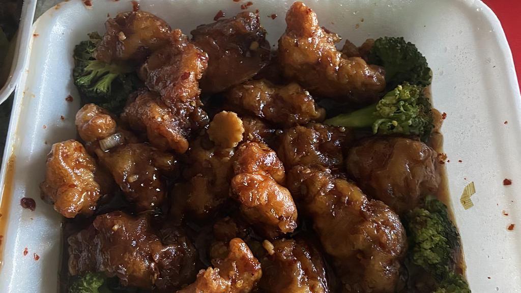 ￼ General Tso'S Chicken · Hot and spicy. Lightly battered chicken sautéed with baby corn and green onions in a tangy sauce and garnished with broccoli. A 