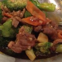Broccoli Beef · Fresh broccoli and carrots brighten up the color to tender slices of beef sautéed in our che...