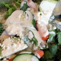 Greek Salad · Tomato, onion, olive, pepperoncini and feta cheese.
