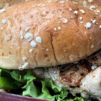 Grilled Chicken Sandwich · Grilled chicken sandwich with cheese, tomato, lettuce, and may on on a potato bun