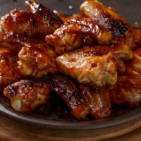 Bbq Wings · Delicious chicken wings baked, then deep-fried to perfection and tossed in BBQ sauce.