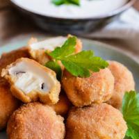 Fried Mushrooms · Fresh hand-breaded mushrooms, deep fried to a golden brown color.
