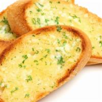 Garlic Bread · Bread, topped with garlic & olive oil, herb seasoning, baked to perfection.
