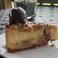 Buckeye Cheesecake · This decadent cheesecake is rich with peanut butter and chocolate on a graham cracker crust.