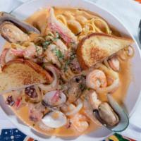Pasta Fuentes · Mexican Italian fusion, fresh pasta cooked in our creamy sauce, mixed with seafood, and a si...