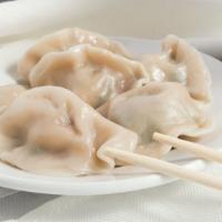 Triple Delight Dumplings (6 Pcs) · Steamed  ,pork and vegetables dumplings served with our ginger soy sauce.