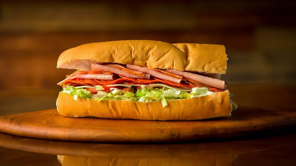 Half Pepperoni & Ham · Pepperoni, oven baked ham, provolone cheese, & 