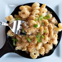 Pork Belly Skillet Mac & Cheese · Cavatappi pasta, pork belly, New Belgium craft beer cheese, smoked cheddar, toasted panko br...