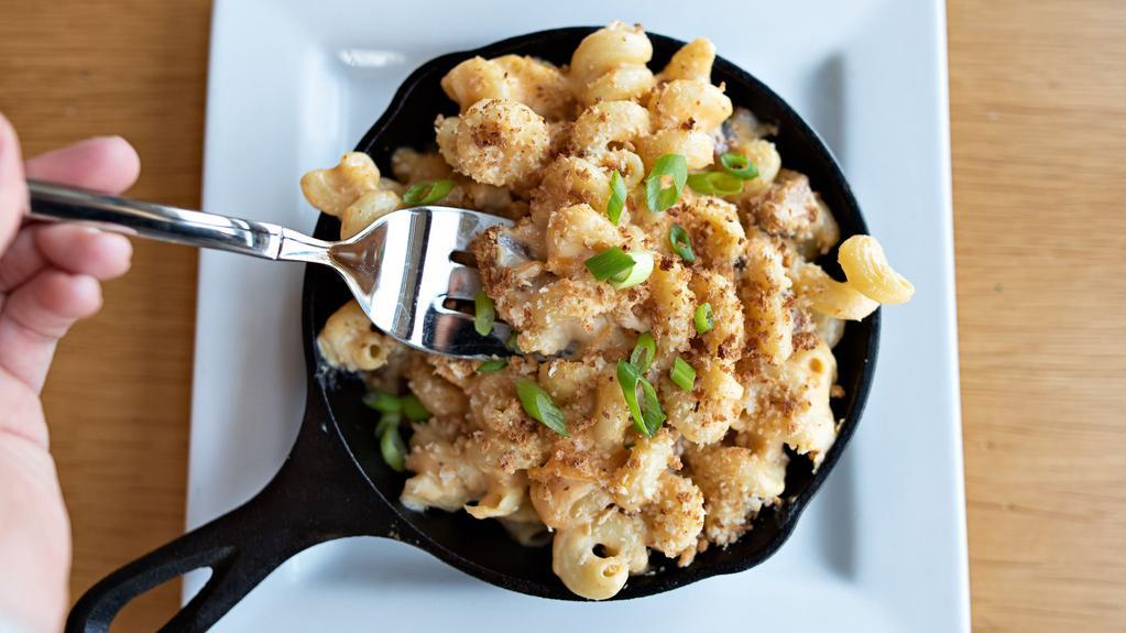 Pork Belly Skillet Mac & Cheese · Cavatappi pasta, pork belly, New Belgium craft beer cheese, smoked cheddar, toasted panko bread crumbs, green onions