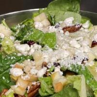 Harvest · Romaine, spinach, diced apples, candied pecans, dried cranberries, feta, poppy seed dressing.