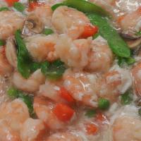 Shrimp With Lobster Sauce · Shrimp, peas and mushrooms stir-fried with creamy lobster sauce.