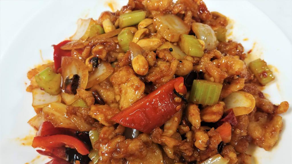 Ch10. Kung-Pao Chicken · Spicy. Marinated chicken chunks with green pepper, onion, mushroom water chestnut sauteed in hot hoisin sauce with peanuts on top.