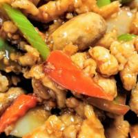 Garlic Chicken · Boneless chicken chunks and green peppers, onion, diced bamboo shoot, mushrooms in a house b...
