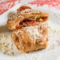 Italian Calzone · A mouthwatering combination of lean Canadian bacon, sliced pepperoni, salami and capicola, o...