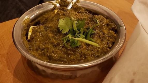 Palak Paneer · Fresh spinach cooked with cubes of cottage cheese delicately spiced.