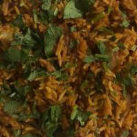 Chicken Biryani · Basmati rice blended with chicken, exotic and freshly roasted spices.