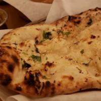 Garlic Naan · Naan bread with hint of fresh crushed garlic.