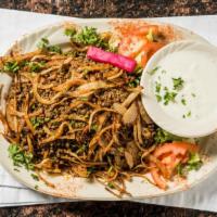 Mujadara · Steamed brown lentil and cracked wheat topped with sautéed onion. Served with yogurt and cho...
