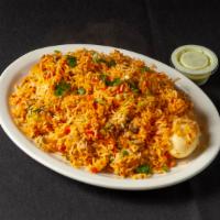 Chicken Biryani Or Chicken Fried Rice · Basmati rice and touch of curry sauce.