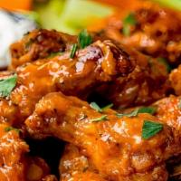 Buffalo Chicken Wings · Best quality wings with buffalo sauce with side of fries