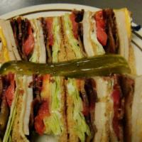 Club Sandwich · Triple decker with turkey, bacon, lettuce, tomatoes and mayo.