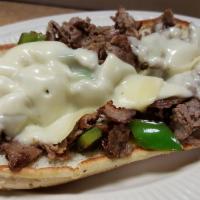 Philly Steak Sub · Swiss cheese, grilled onions and green peppers.