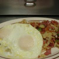 #12. Corned Beef Hash & Eggs · With 2 XL eggs, toast and jelly.