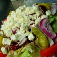 Greek Salad · With lettuce, tomatoes, cucumbers, onions, beets, pepperoncini, olives and feta cheese.