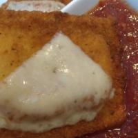 Toasted Ravioli · Four breaded raviolis baked with provolone cheese served with marinara sauce.