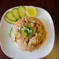 Crab Fried Rice · Delicious fried rice with crab meat, green onions, egg, carrot, and tomato, topped with cila...