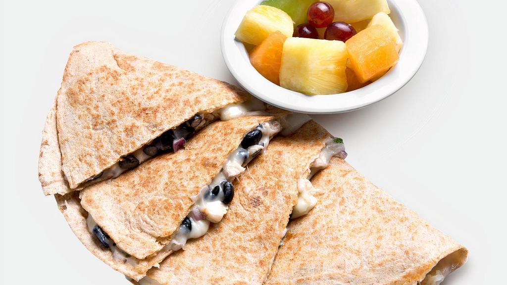 Ph Chicken Quesadilla · Diced grilled all-natural chicken, low-fat mozzarella, cilantro, black bean salsa on whole wheat tortilla served with a side of fruit.