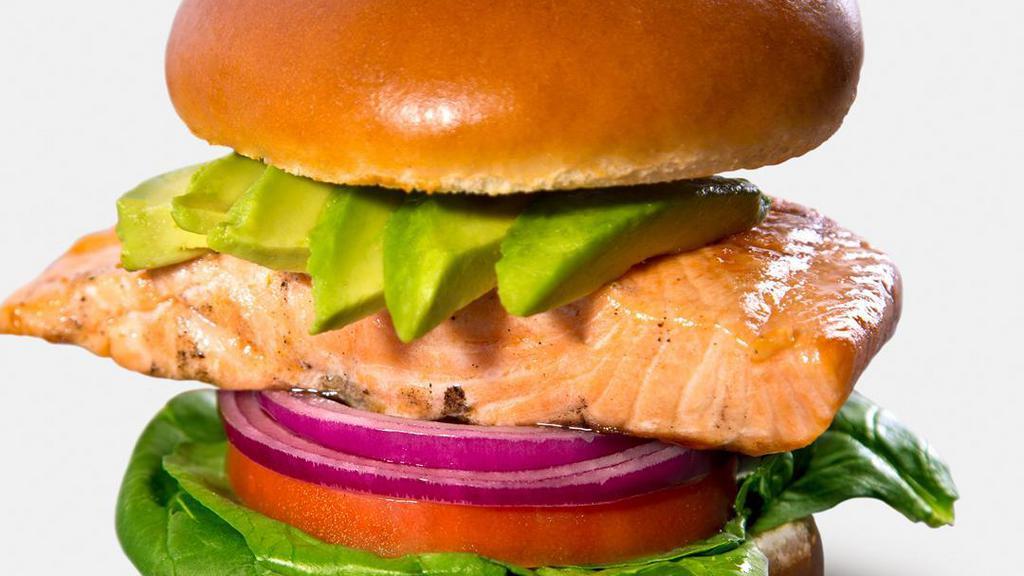 Salmon Burger · Sustainable salmon, spinach, onions, tomatoes, avocado, agave mustard.