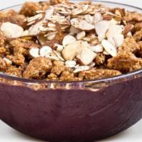 Acai Nutty Butter Bowl · Organic unsweetened acai, chocolate whey, soy milk, peanut butter, agave. Topped with almond...
