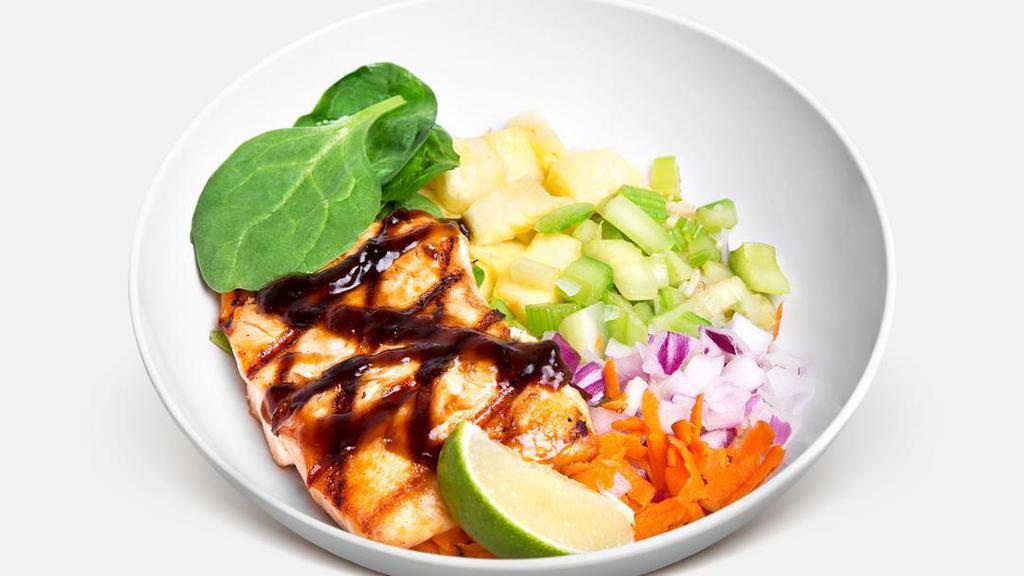 Teriyaki Bowl · Grilled sustainable salmon, pineapple, celery, red onions, spinach, carrots, and house-made teriyaki sauce. Gluten-free.